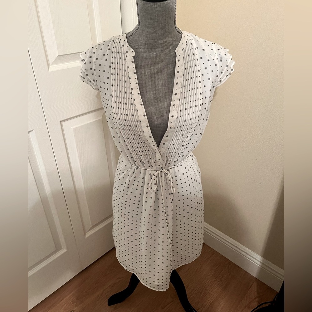 Dress. Knee length. Business casual.